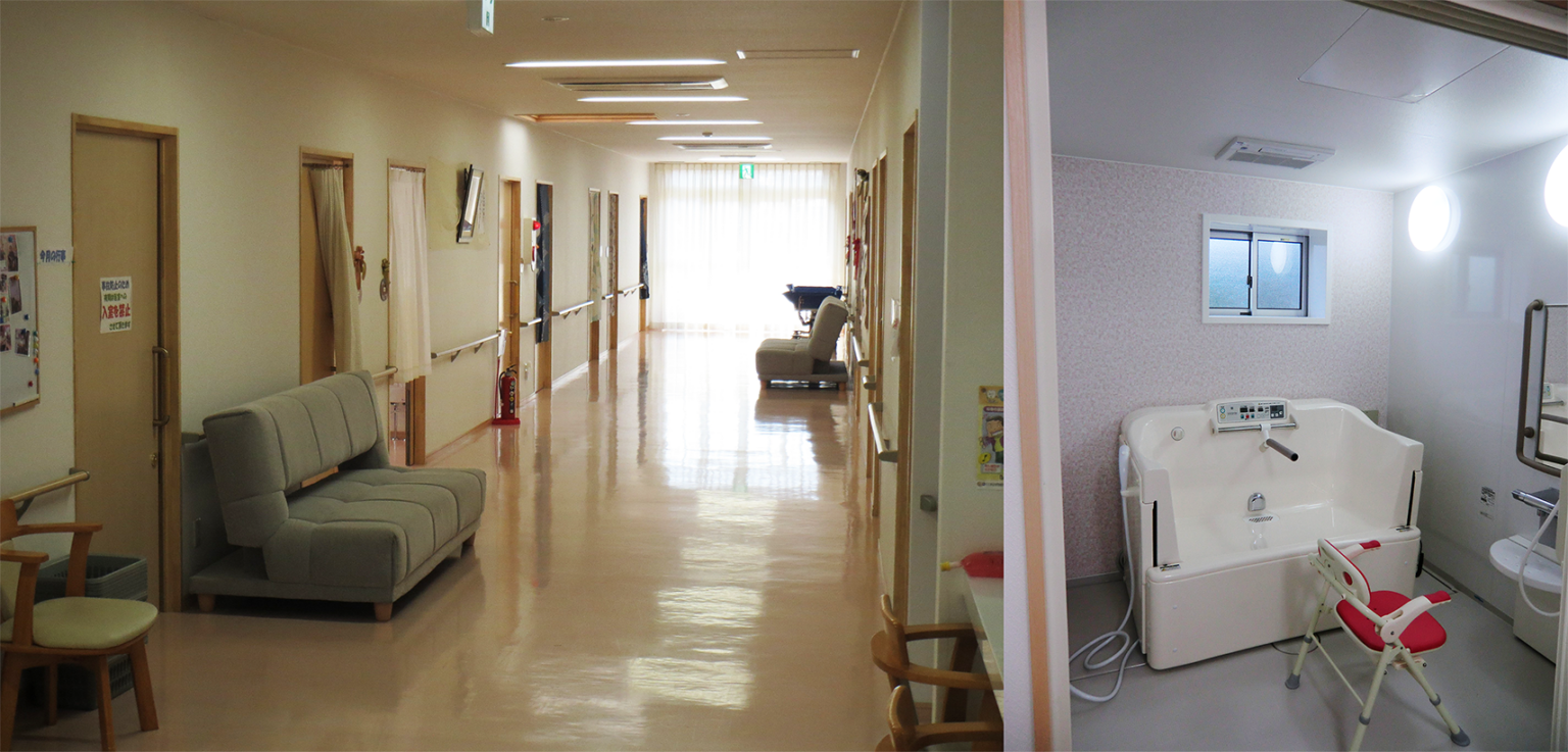 介護施設の廊下・共用スペース。ソファが配置され、安全柵が設置された明るい通路